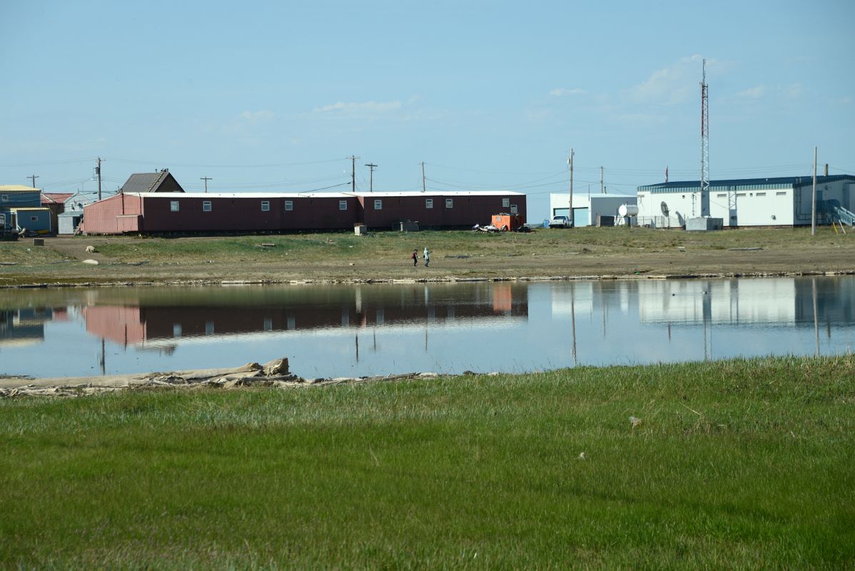 21 Buildings Reflected In The Water At Tuktoyaktuk Northwest Territories